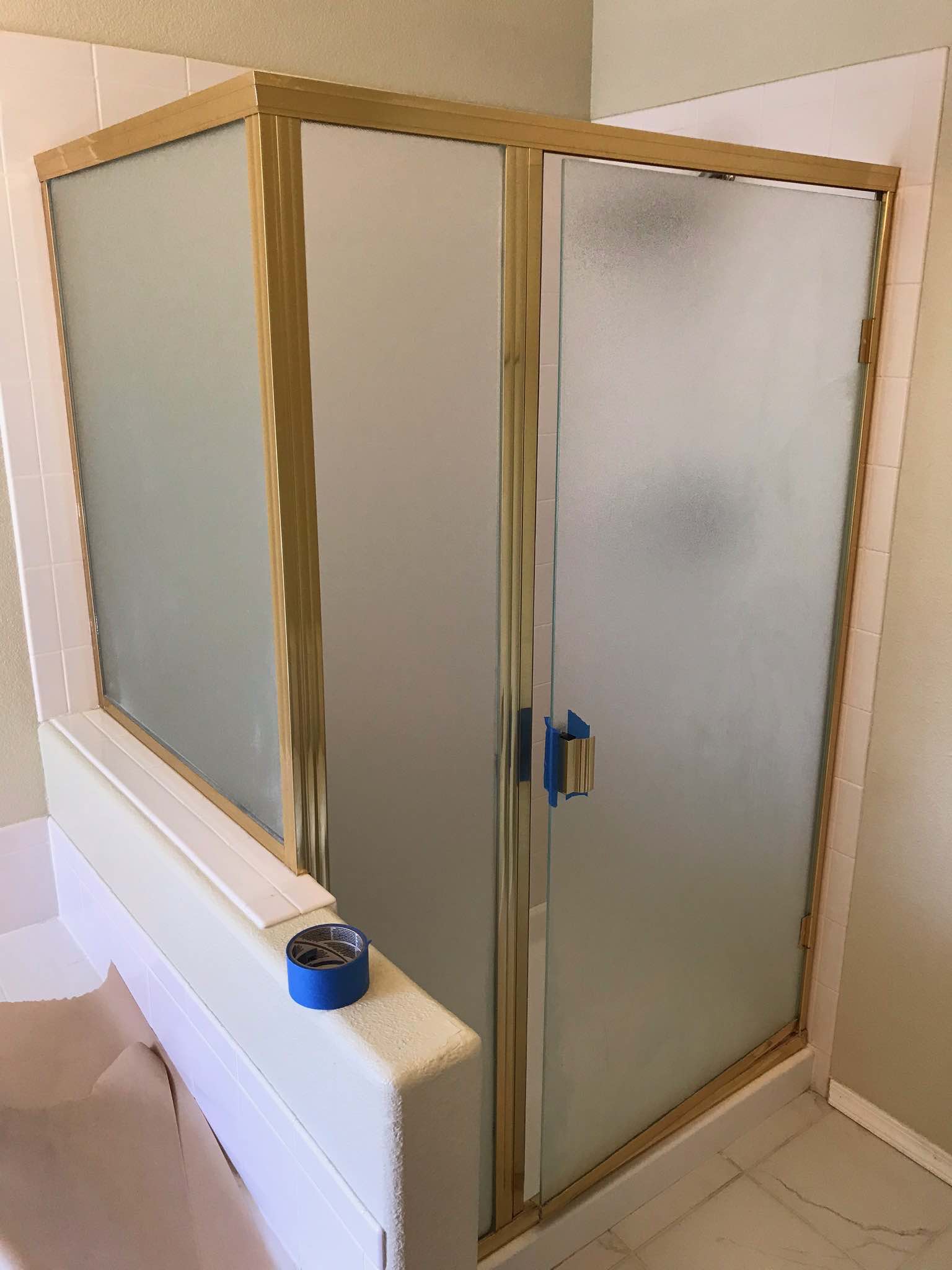 before gold brass shower makeover