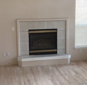 Before brass fireplace makeover